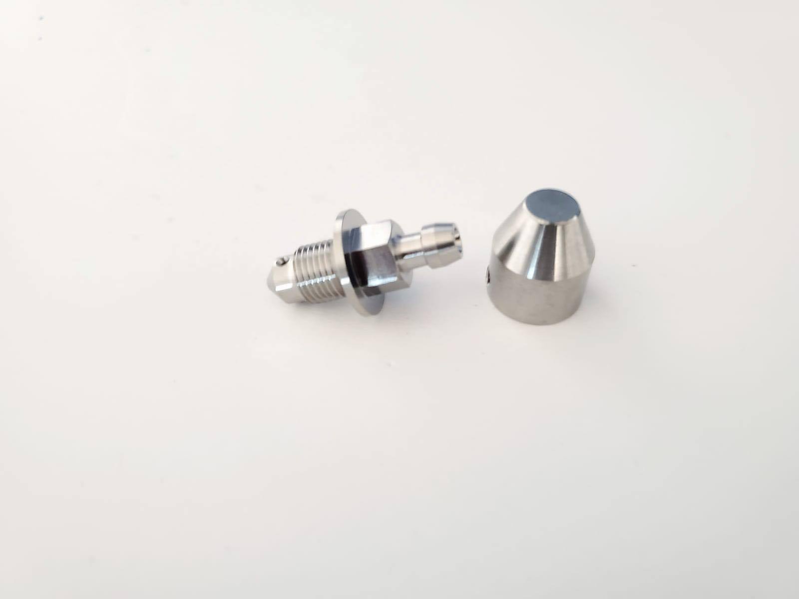 Titanium bleeders with caps