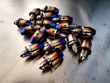 Titanium bleeders with caps
